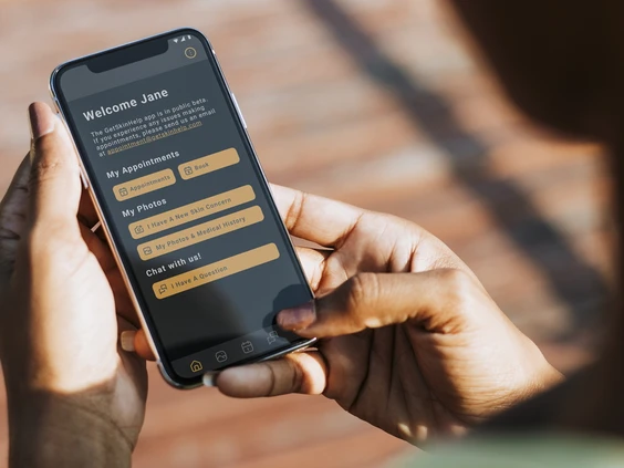 Hands using a medtech app