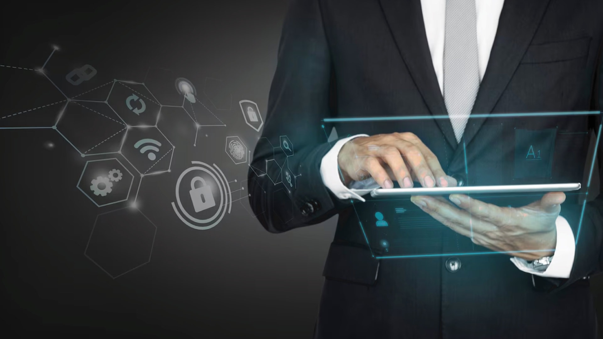 Business man protecting data personal information on tablet,Padlock icon and internet technology networking connection on digital dark blue background