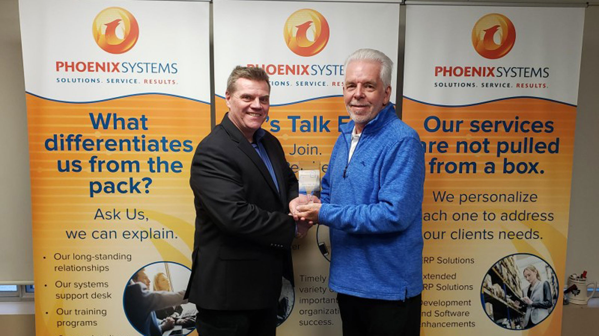 Phoenix Systems receives award.